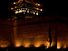 Alien Life Form Photo: A child unknowingly creates a shadow puppet against a large defensive wall.  The ancient city of Pingyao is surrounded by these well-preserved walls and has earned itself a place as a UNESCO world heritage site.