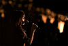 Jazz Singer Photo: Lone singer under the spotlight at an open-air Jazz festival.