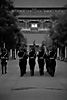 Forbidden March Photo: Every evening at Tienanmen Square in Beijing, the masses crowd around the Chinese flag as soldiers retire the ol' red and yellow for the night during a formal flag lowering ceremony.  Afterward, the soldiers march through the tunnel underneath the large painting of Mao towards the Forbidden City.