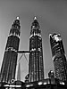 Petronas Towers & Fountain Photo: Long exposure photo of an unforgettable landmark in the capitol of Malaysia.  The towers incorporate much Muslim symbolism and provide many floors of office space.  Meanwhile, at the base is the Suria KLCC, a mega-mall that serves as an air conditioned escaped from the muggy Kuala Lumpur climate.  The entire complex is surrounded by a pleasant park, perfect for an evening stroll.