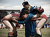 Mongolian National Passtime Photo: At the Nadaam Festival, a pair of wrestlers get a closer inspection by a referee.