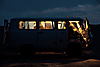 Toaster Van Photo: Our tour stops each night to bed down in the Gobi Desert.  Our driver, along with other tours' drivers get together for an evening of booze and laughs.  The vehicle is called a Jaman Yos, a Soviet era van known for its robustness and ease to maintain.