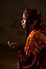 Charity Case (Part I) Photo: The unbearable afternoon heat forced me to find shade at a small mosque where I met this beggar asking mosque goers for spare change.  She saw my camera and asked me for a photo so I one upped her and set up my stand and strobe for a quick modeling session.  The picture was posed but the sentiment is real.