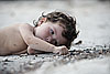 Sand Doodling Photo: Lorella, the photogenic daughter of a Basque family staying on the island.