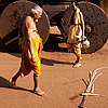 Passersby (Ratha I) Photo: Each full moon, Brahmins climb aboard the small ratha (chariot) to be pulled down the street by a throng of Gokarna villagers, accompanied by drummers and musicians.  Once a year, during the festival of Shivarathri, Brahmins cram into the large ratha pulled through a swarm of humanity, the likes of which is only typically be seen in India.