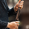 Rifleman (Miao Minority I) Photo: A Miao ethnic minority man loads his rifle for demonstration.  Even in present times, Miao men are always armed with a weapon.