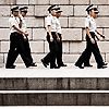 Out of Step Photo: A group of young "police" officers walk in loose formation down Cheonggyecheon (청계천) Stream in Seoul.  Korean residents are obliged to serve in the military but some skirt gun-toting duty by being assigned as civilian police officers.