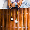 Percussion Perspective Photo: A young girl plays a Thai traditional instrument called a ranat ek (ระนาดเอก).