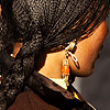 photo: Braided - A Tibetan woman's intricately braided hair.