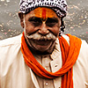 Devotees Photo: Pilgrims, grandfather and grandson, pose for a picture on the ghats of the holy Jamuna river.