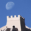 Barrier's Bounds Photo: The moon sets over the far western end of the Great Wall of China.