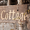 Connected Cottage Photo: Vacationers use wifi on the beach to video chat with friends at home.