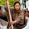 Belligerent Boatmen Photo: A Kashmiri woman is physically barred from boating away at the floating vegetable market.