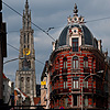 Aged Edifice Photo: A van waits at a three way intersection near Groenplaats and the Cathedral of Our Lady.