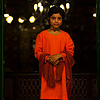 Puckish Pals Photo: A young Kashmiri girl poses for a photo at the entrance to the Shah-e-Hamdan mosque.