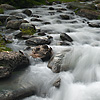 Paradise on Earth Photo: A stream flows from the nearby snow-capped mountains.