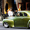 Nostalgia Photo: A green Plymouth Deluxe Coupe parked outside a restaurant.  (From the archives, due to time restraints.)