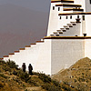 Dzong Stroll Photo: Tibetans walk around the rebuilt Samdrubtse Dzong fortress (archived photos, on the weekends).