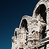 Horned Gladiator Photo: A corrida is advertised on the fence of a well-preserved Roman arena, now used often for bull-fights (yes, of the Spanish variety, popular in this region of France).