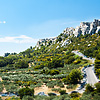 photo: Bauxite Base - Chateau des Baux lies in ruins surrounded by the picturesque fields of Provence.