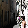 French Forecaster Photo: A young woman reads the informative plaque outside of Nostradamus' house.