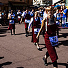 Gallic Gait Photo: Local wait staff run through old city while balancing "drinks" on a tray.