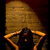 Luminescent Lady Photo: A beautiful young woman poses under a red Chinese lantern on a traditional village street (ARCHIVED PHOTO - on the weekends).