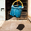 Drop Delivery Photo: A hanging basket lowered from an apartment window.