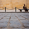 Sweeping Soldier Photo: A street-cleaner rests on a bench in Islamic Cairo.