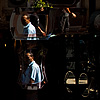 Mirrored Mugs Photo: An Egyptian man's reflection at a mirror store in Islamic Cairo.