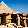 Afterlife Adoration Photo: The passageway remains of the mortuary temple adjacent to the Pyramid of Menkaure (not pictured) with the Pyramid of Khafre in the background.