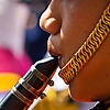 Royal Marching Band Photo: A flutist in the marching band portion of the King's birthday parade.