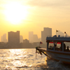 River Boat Chao Phraya Photo: A Chao Phraya river boat taxi plies the water in the early morning.