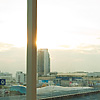 Downtown Bangkok Sunset Photo: View of downtown Bangkok and the Siam sky train stop seen from the sixth floor of the Paragon Mall.