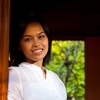 Thai Teak House & Model Photo: A beautiful Thai model poses in a traditional Thai teak wood house.