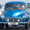 Morris Minor Classic Photo: A classic Morris Minor car comes cruising over the Phra Pinklao bridge in Bangkok.