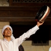 Egyptian Whirling Dervish Photo: A Sufi dancer ends a routine with gusto at the Al-Ghouri complex in Cairo (ARCHIVED PHOTO on the weekends - originally photographed 2010/07/03).