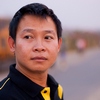 Vientiane Native Photo: A local Vientiane Laotian poses for a photo on the Mekong River promenade.