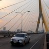 Sunset Rama VIII Bridge Photo: A beautiful sunset at the Rama VIII cable-stayed suspension bridge near Kao San Road in Bangkok.