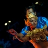 Traditional Thai Dance Poles Photo: A unique traditional Thai dance performance featuring a female dancer controlled by a puppet-master using poles.