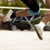 Takraw Foot Volleyball Photo: Two Thai guys challenge each other at the net for a loose takraw ball.