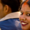 Beaming Bride Photo: A momentary glance from a cute Indian bride as she rides pillion with her new husband (ARCHIVED PHOTO on the weekends - originally photographed 2008/01/26).