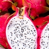 Pitaya Piles Photo: Dragon fruits piled up for sale at a local outdoor produce market in Bangkok.