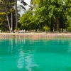 Clear Canal Photo: A canal off Annecy Lake containing the immaculate glacial runoff of the surrounding Alps.