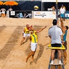 Geneva Games Photo: Men compete in the Coop Beach Volleyball Tournament along the edge of Lake Geneva.