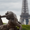 Iron Locks Photo: A statue on the Alexandre III Bridge with the Eiffel Tower in the background.