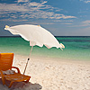 Power of One Photo: A lone beach chair and umbrella on a beautiful white sand beach on the Thai island of Ko Lipe (ARCHIVED PHOTO on the weekends - originally photographed 2007/03/12).