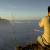 Cliffhanger Competition Photo: A spectator watches the Maverick's surfing competition at dawn in Half Moon Bay, California (ARCHIVED PHOTO on the weekends - originally photographed 2006/02/07).