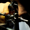 Timepiece Tool Photo: A lathe type machine used to mill down an already tiny piece of raw metal for use in watchmaking.