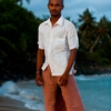 Seaman & Scenery Photo: A lungi-clad Sri Lankan fisherman stands on a rock on a beach in Mirissa (ARCHIVED PHOTO on the weekends - originally photographed 2008/05/14).